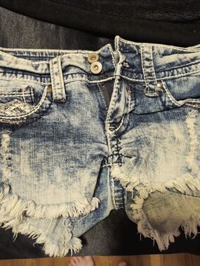 Distressed Light Wash Denim Cutoff Shorts